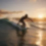 Graceful surfer riding a wave at sunset