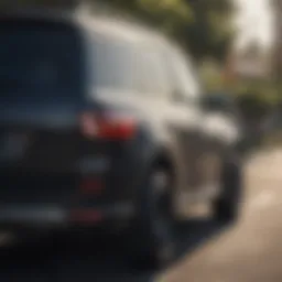 Surfboard rack pads on a sleek black vehicle