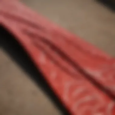 A vibrant red surf tie with intricate patterns