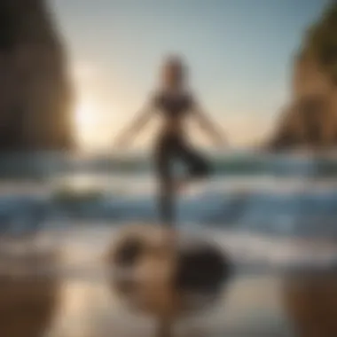 Yoga practitioner achieving a challenging balancing pose by the sea