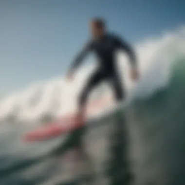 A surfer wearing a Jacks wetsuit, riding a wave, demonstrating performance and style