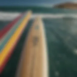 A vibrant surfboard collection showcasing different designs and colors.