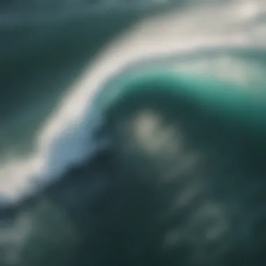 Surfer on wave with drone view