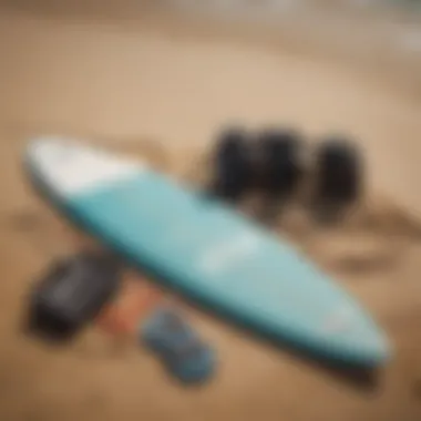 Surfing gear on sandy beach