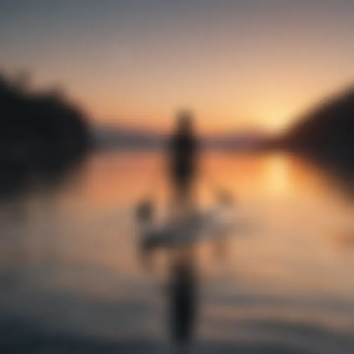 A serene sunset backdrop as a paddleboarder navigates through calm waters