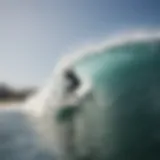 A surfer riding a wave on a wakesurf board in Los Angeles